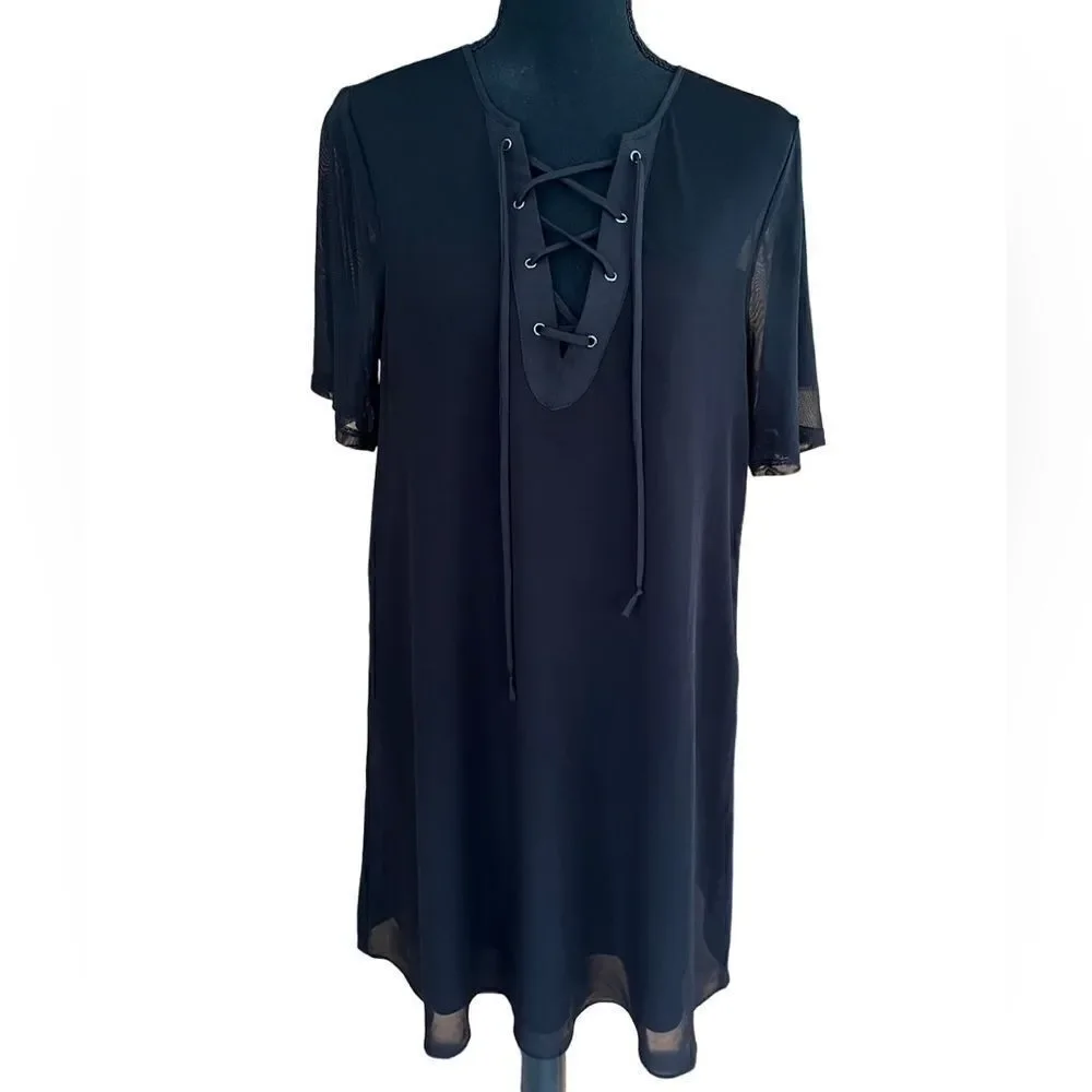BCBGeneration black lace up front dress with mesh shoulders, relaxed fit size M